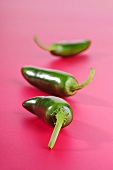 Three jalapeño peppers (chillies)