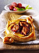Puff pastry pastries with plums