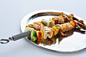 Grilled seafood and vegetable kebabs