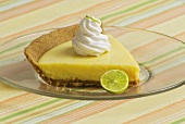 Slice of Key Lime Pie on Glass Plate