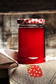 Red fruit jelly in a jar