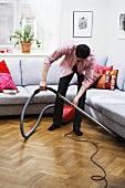 Man vacuuming