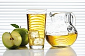 Apple juice in glass and glass jug