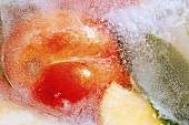 Peach in block of ice (close-up)