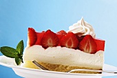 Piece of strawberry-yogurt cake on plate