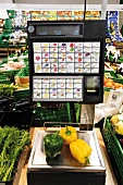 Germany, bell pepper on supermarket scale, close-up, elevated view