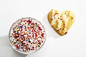 Heart-shaped biscuit with sugar pearls (Christmas)