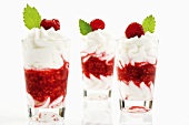 Raspberry puree with cream in three glasses