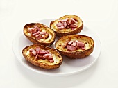 Baked potatoes with cheese and ham