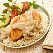 Chicken Breast with Mushroom Sauce over Rice; Tomato Cucumber Salad