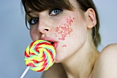 Young woman with lolly