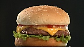 A rotating cheeseburger
