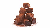 Dusting brownies with cocoa powder