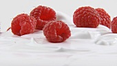 Cream with raspberries