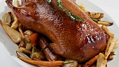 Roast duck with root vegetables