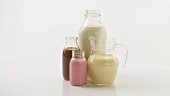 Strawberry milk, chocolate milk, milk and vanilla milk