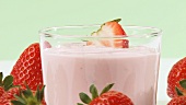 Strawberry yoghurt and fresh strawberries