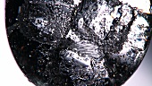 Sparkling water with ice cubes (detail)