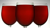 Three glasses of red wine