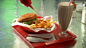Burger with chips and chocolate shake