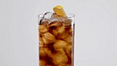 Iced tea with ice cubes in a glass