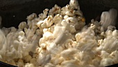 Making popcorn in a frying pan
