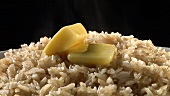Brown rice with knobs of butter