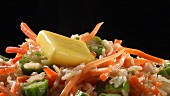 Brown rice with carrots, okra pods and knob of butter
