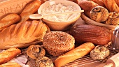 Various types of bread, bread rolls and flour