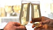 Toasting with champagne glasses