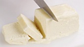 Cutting vanilla parfait into slices