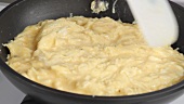 An omelette being cooked