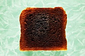 Slice of burned toast, close-up