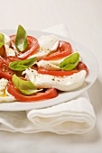 Tomatoes with mozzarella and basil