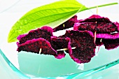 Dried pitahaya slices on cocktail sticks