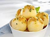 Potato dumplings with buttered breadcrumbs and parsley