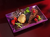 Chocolate mousse and chocolate cake with berries