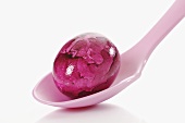 Purple Easter egg on spoon