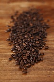 Coffee beans on wooden table