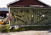 Implements on a shed wall