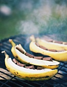 Chocolate-stuffed bananas on barbecue
