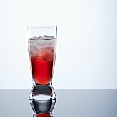 Campari with ice cubes in glass