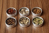 Assorted spices in small tins
