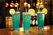 Blue Crush cocktails with rum on bar