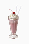 Strawberry shake with cream and cherry