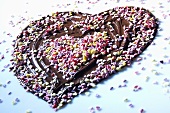 Chocolate heart with sugar hearts