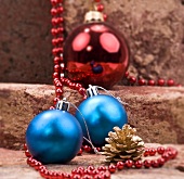 Christmas baubles, cone and string of beads