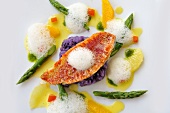 Red mullet with asparagus, purple potatoes and citrus fruit
