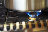 Burning flame on a gas stove (close-up)