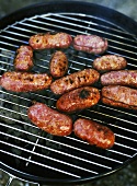 Sausages on barbecue